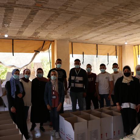 Young Volunteers from ActionAid Palestine(AAP) youth groups  from governorates  of Hebron and Bethlehem in the south of West Bank package food parcels to be distributed  on families in health quarantine and marginalized through AAP’s response to COVID-19. Hebron – South of West -Palestine -Copy Rights of ActionAid Palestine 2020
