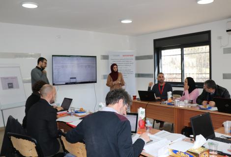 A young woman during an interview by a group of specialist in Social enterprise and entrepreneurship to present her enterprise to get fund through the project of “Social Innovation”