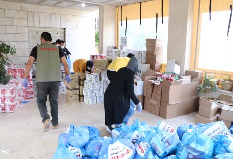 Members of youth groups and staff members of ActionAid Palestine participate in packing and preparing hygiene kits supported by AAP to distributed to the infected families by corona virus in the marginalized villages in Bethlehem and Hebron in the south of West Bank 