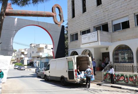 Photo of AAP’s staff members and volunteers during the distribution of hygiene kits in Aida refugee camps in Bethlehem governorate in the south of West Bank within the response of AAP to the second wave of COVID-19 