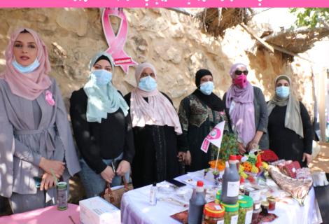 Photo of women from women groups of ActionAid Palestine during their participation in a charitable pink bazaar on the occasion of pink month or October for raising awareness about the importance of early detection of Breast Cancer starting on the first of October every year. Hebron -south of West Bank -Copy Rights for ActionAid Palestine 2020