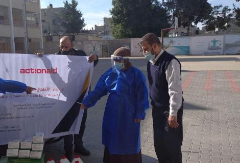Photo of Rasha Abu Hasoun during her participation in one of the preparedness and response actions implemented by ActionAid Palestine to respond to COVID-19 crisis in Occupied Palestinian Territory -Gaza Strip- Coy Rights for ActionAid Palestine 2021