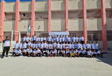 Photo of  children of Karameh school while they were getting ready to participate in marathon that was organized by ActionAid Palestine in partnership with the directorate of education in the  south of Hebron Governorate -Hebron -West Bank -Palestine -Copy Rights to ActionAid Palestine 2021 