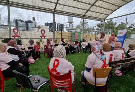 Photo of a group of women during their participation in raising awareness activities on importance of early diagnosis of breast cancer in Tel Rumeida in the old city of Hebron in Hebron Governorate within the activities of October pink -West Bank -Palestine -copy Rights for ActionAid Palestine 2021