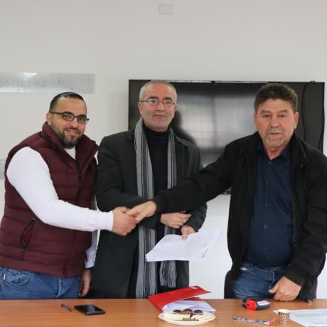 Picture of signing ceremony in ActionAid Palestine office in Hebron in south of West Bank 