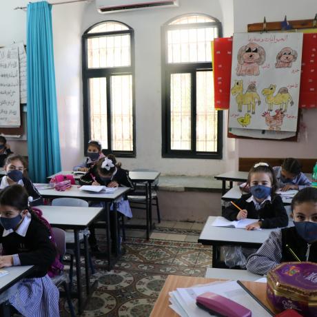 Female students are studying in their school based the old city of Hebron Governorate in the South of West Bank while they are committed to safety measure and wearing masks due to COVID-19 -Hebron-South of West-Copy Rights for ActionAid Palestine 