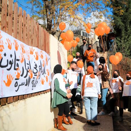 Photo of Members of active youth groups while they were releasing orange balloons during 16 days campaign of Activism against Gender based violence (GBV) in Ramallah-West Bank -Palestine -Copy Rights for ActionAid Palestine 2020
