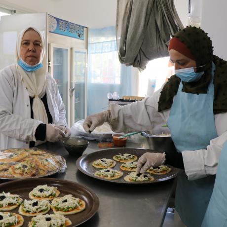 Photo of working women in Al-Zahra’ Kitchen within “Valiance “Basala”-Empowering women in the old city of Hebron,H2,”-Hebron Governorate -South of West Bank-copy rights for ActionAid Palestine 2021)