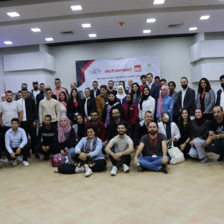 Photo of young people, staff members of ActionAid Palestine and her excellency , Palestinian minister of Women Affairs and representatives of partners senior country program adviser at representation of Denmark to the Palestinian Authority during the closing ceremony of project of “ Civil and Democratic Participation of Palestinian Youth “that ActionAid Palestine  launched in 2018  and implemented in partnership with   Alternative Information Center,  the Palestinian Center for Policy Research and Strategic