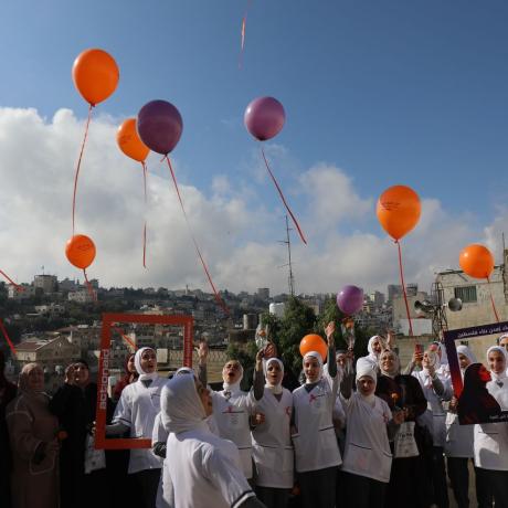 A photo of the 16 Days of Activism campaign activity against gender-based violence with women in the Old City of Hebron, 2025 Hebron – Southern West Bank –